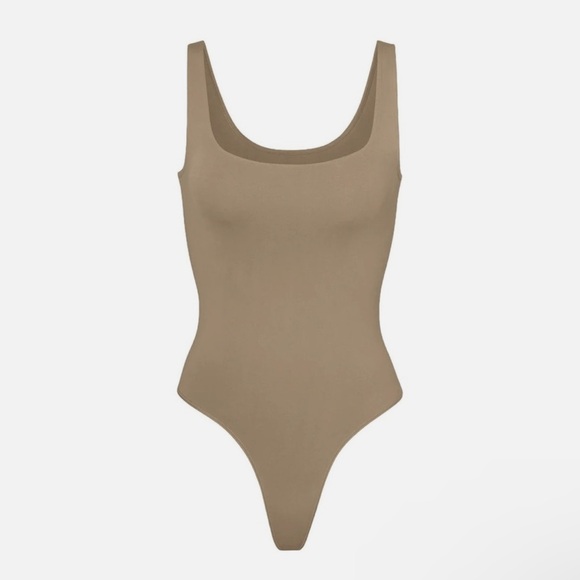 SKIMS Soft Smoothing Seamless Thong Bodysuit in Desert - Picture 1 of 3